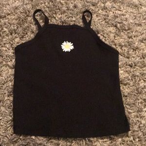 Black tank top with sunflower in the middle